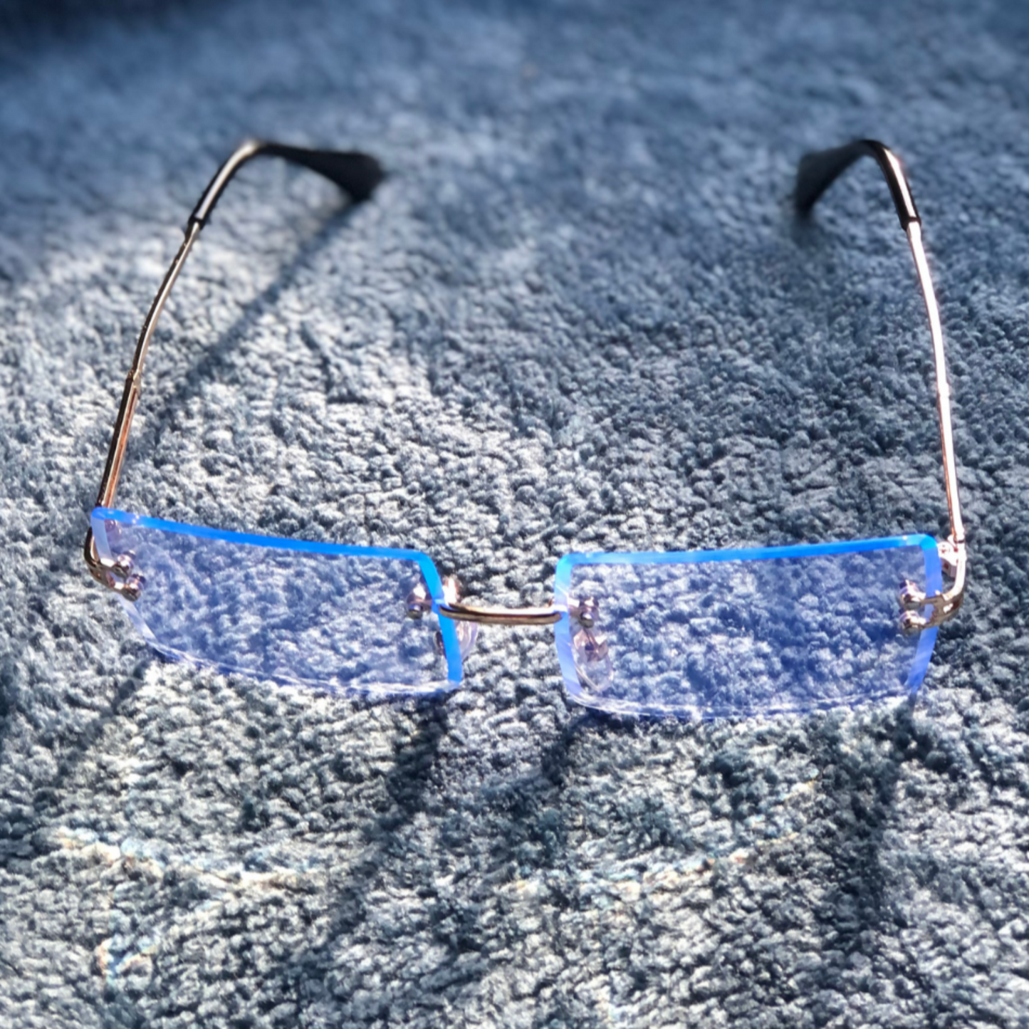 rimless blue lens sunglasses